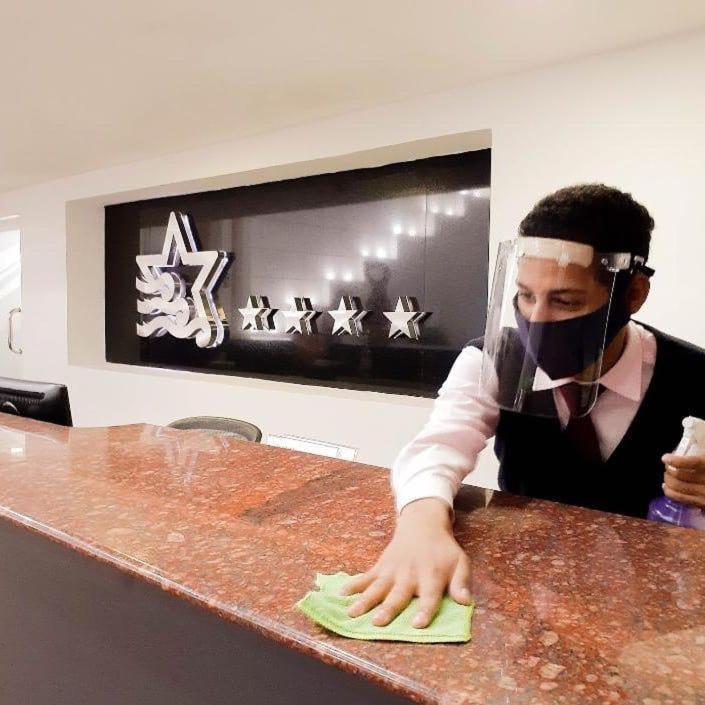 Hotel Cristina Suites Puerto La Cruz Kültér fotó